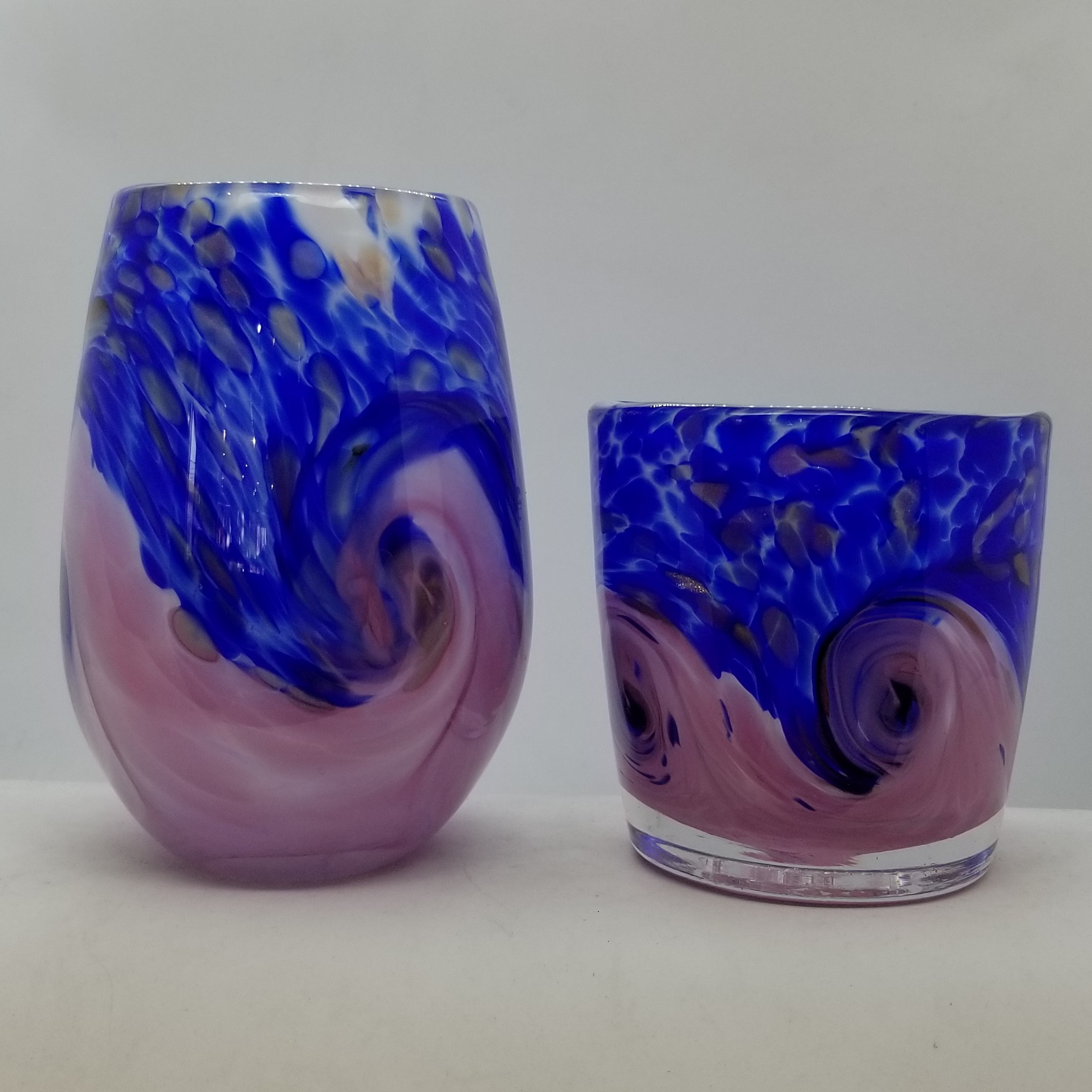 Pink and blue stemless and rocks glass