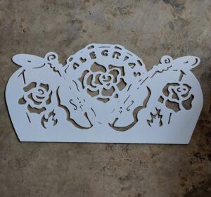 bench back design with roses and violins